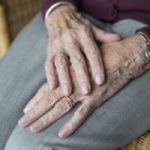 Close up of a senior's hands in an assisted living community near Covington